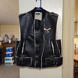Brand new!! NWT The Greii boutique black vegan leather & sherpa vest size small